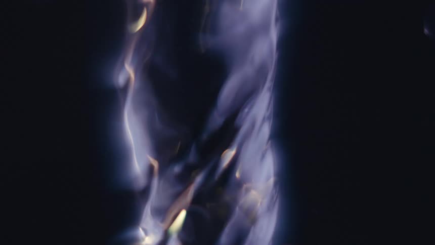 Close up of swirling clear water against a black background