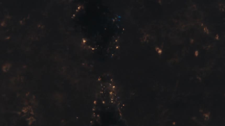 Extreme closeup of a shimmering spiral underwater