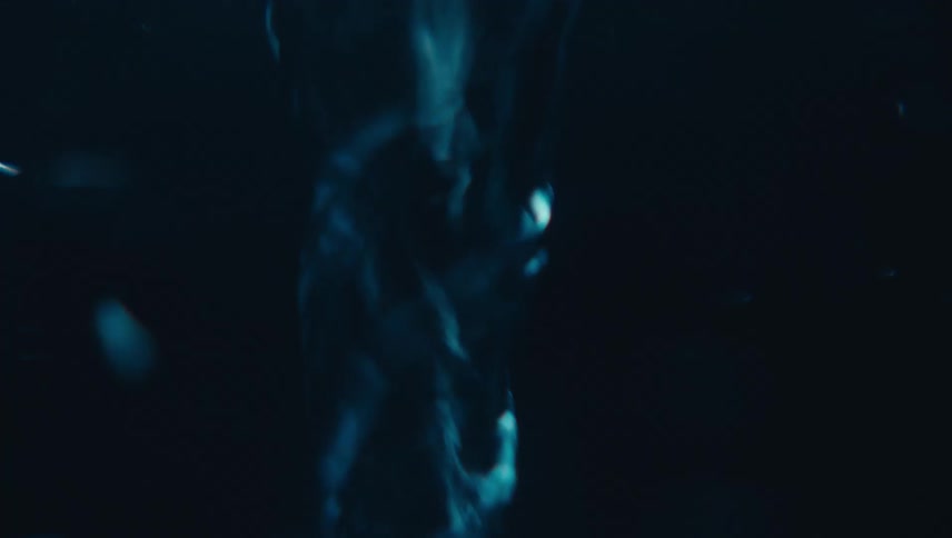 Close up of swirling clear water against a black background