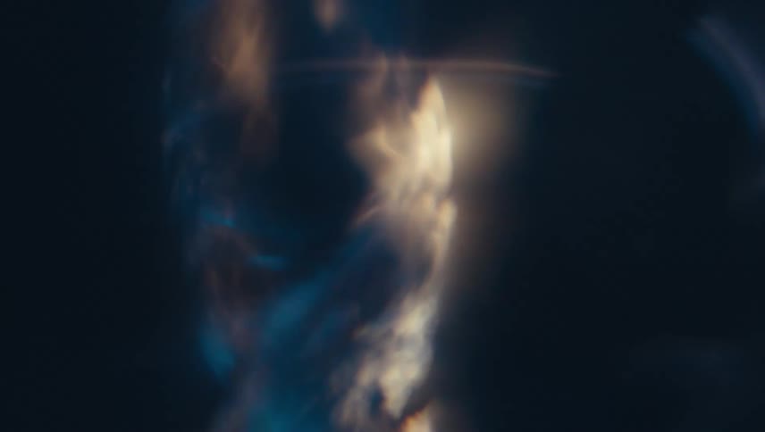 Close up of swirling clear water against a black background