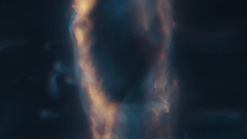 Extreme closeup of a rapidly moving and abstract spiral underwater