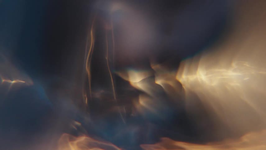 Closeup of a spiral underwater with reflections