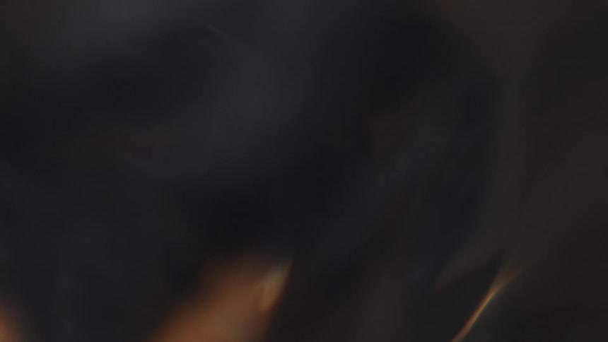 Extreme closeup of abstract water in fast motion with reflections