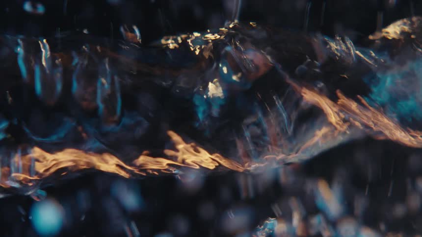 Close up of swirling clear water against a black background