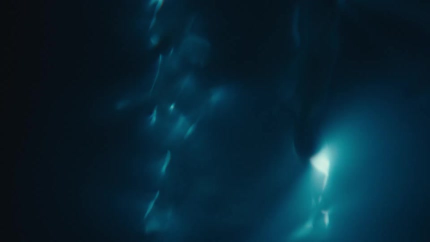 Close up of swirling clear water against a black background