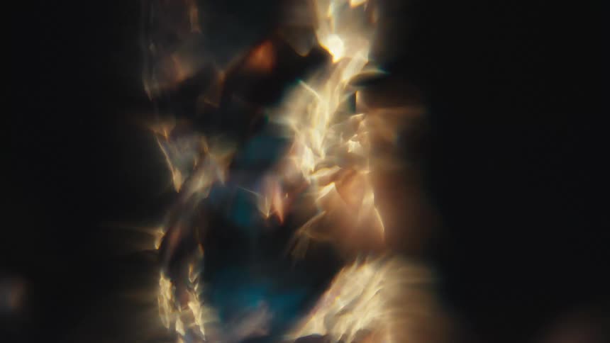 Spiral within water with abstract reflections