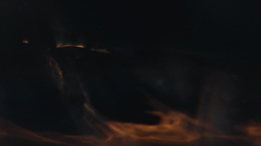 Light flickering across a spinning water whirlpool