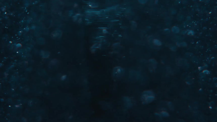 Extreme closeup of the formation of a spiral underwater