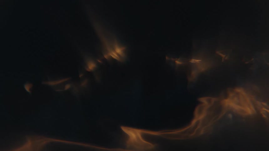 Close up of light shining on a vortex of swirling clear water