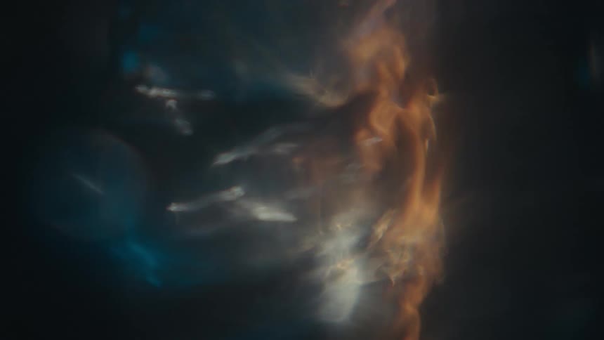 Extreme closeup of a water spiral spinning and unraveling