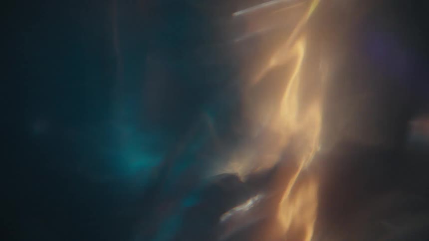 Close up of swirling clear water against a black background