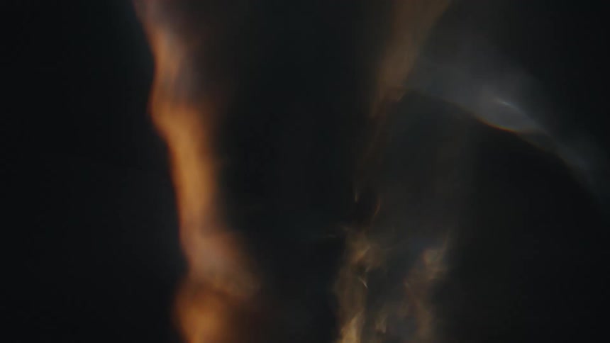 Closeup of a rapidly moving and abstract spiral underwater