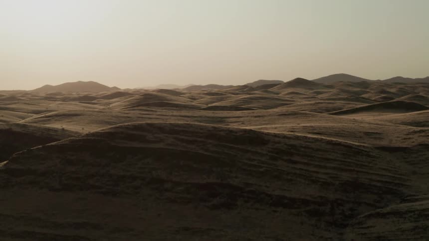 Aerial panorama of dunes in the desert in the morning