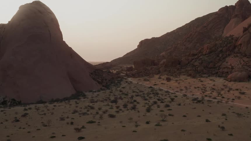 Panorama of peaks and mountains in a valley in the morning