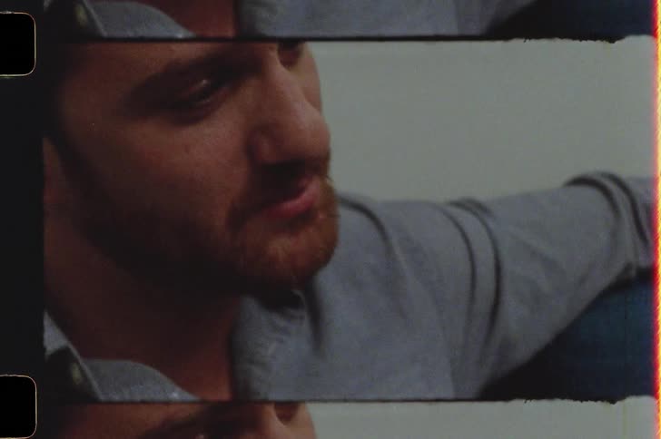 Portrait of a redbearded man sitting