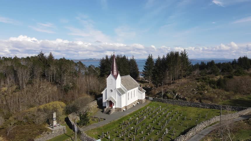 Aerial view of a small church in the countryside
