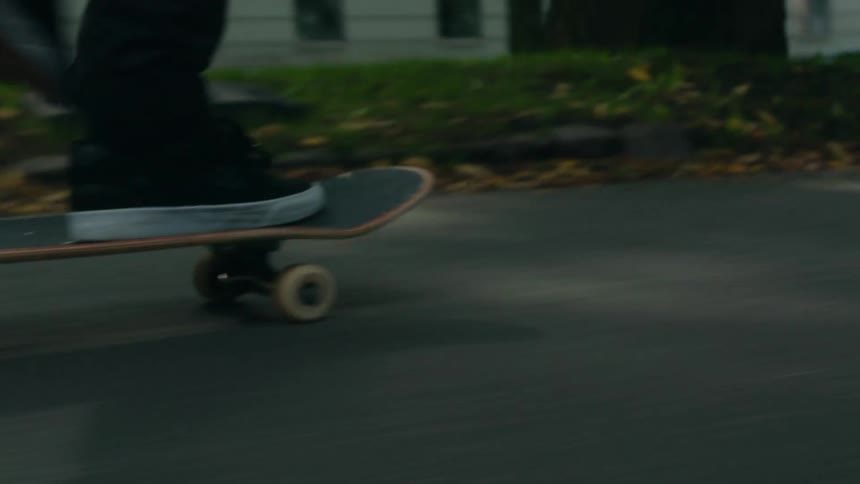A man skateboarding outdoors