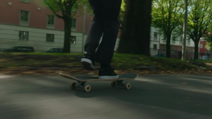 A man riding a skateboard outdoors