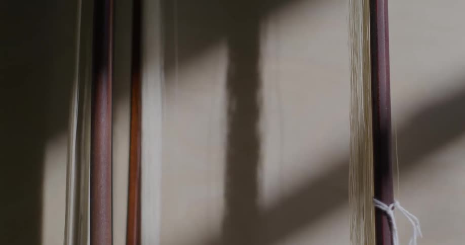 A wall with some wood and shadows