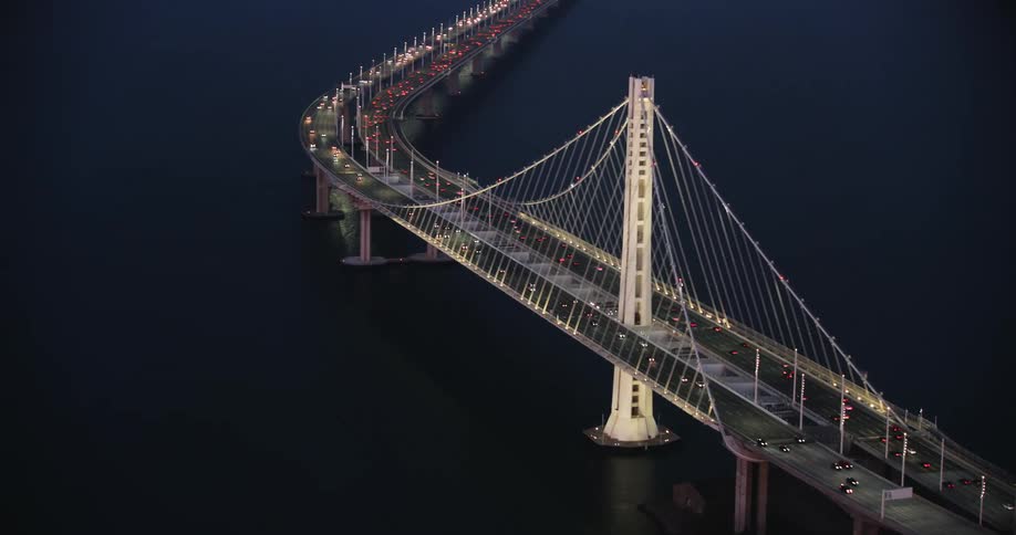 The San Francisco Bay Bridge is driven on by numerous vehicles
