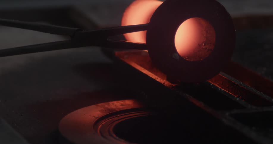 Molten metal is poured into a mold