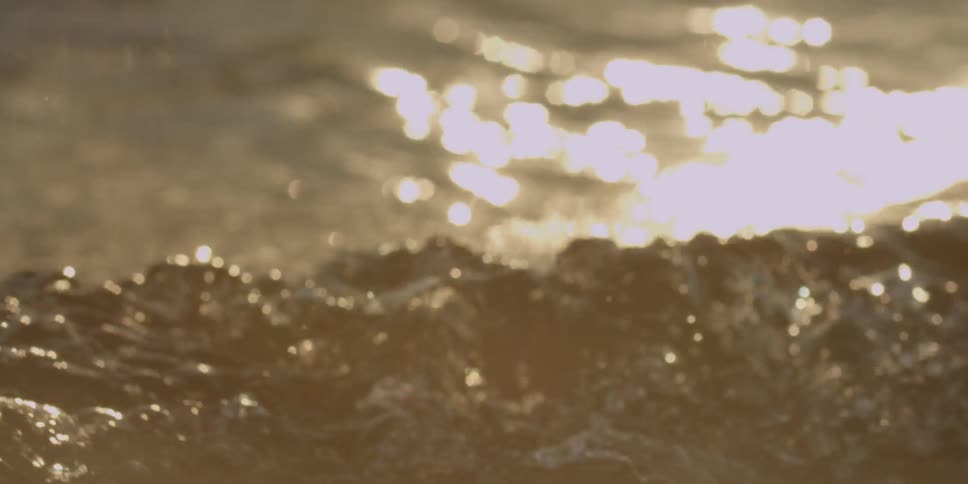 Waves of brownish water