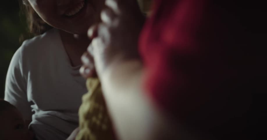 A mother is breastfeeding her baby