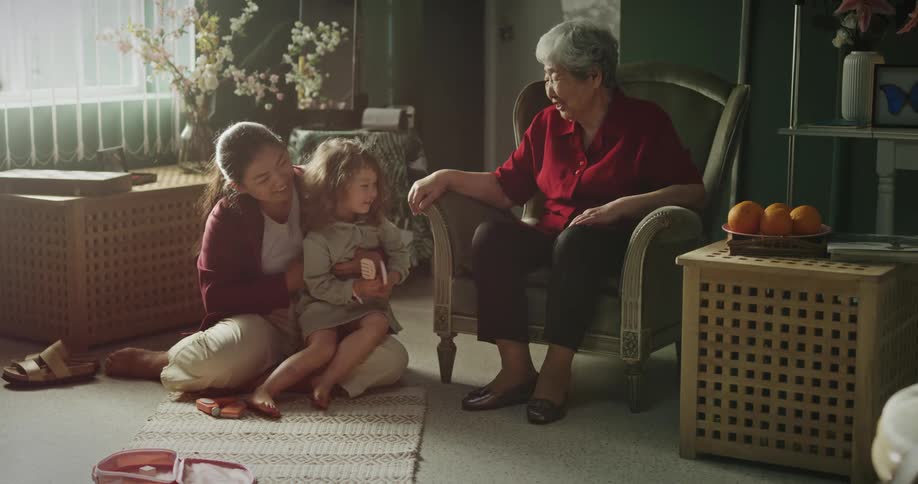 A happy family gathered in the living room during the day