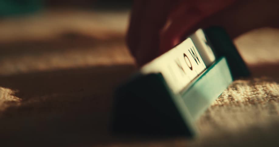 A close up clip of a scrabble game