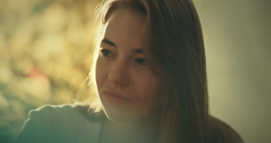 Blonde woman listens to a friend talking