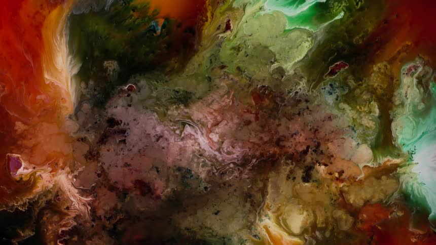 Slow motion of dense colorful and abstract art fluid