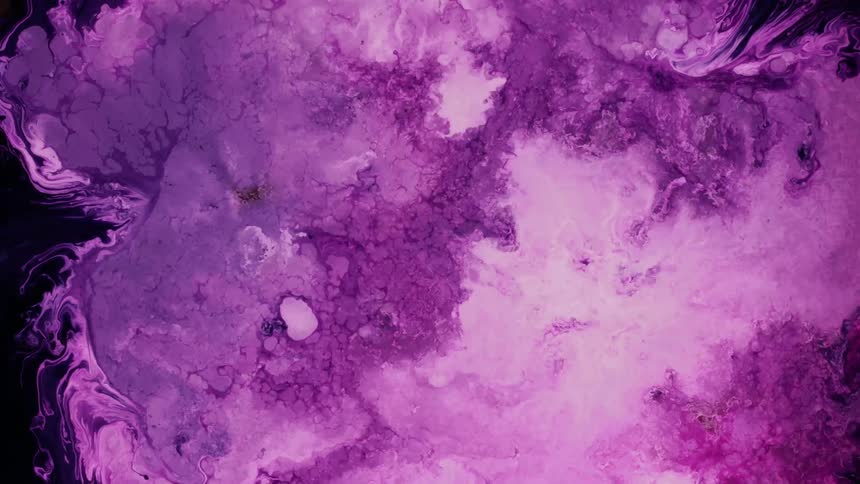 Abstract liquid dye art of violet waves of liquid ink