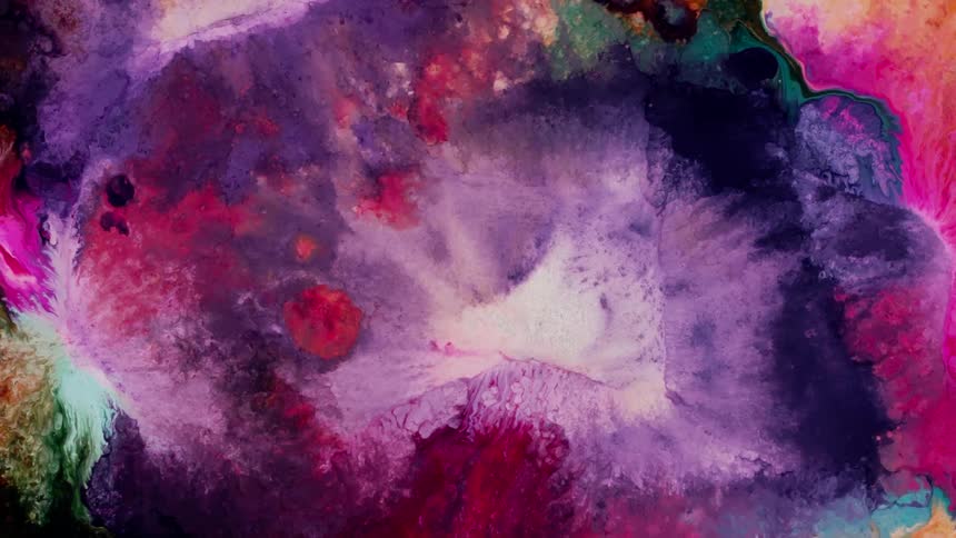 A mixture of different colors swirls and churns to create a striking scene