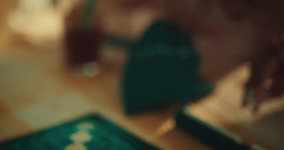 Closeup of hands of people playing a game