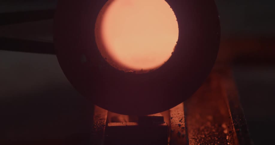 Molten steel flows through a steel pipe