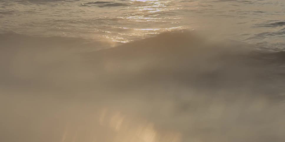 Sunshine glistens off of flowing water