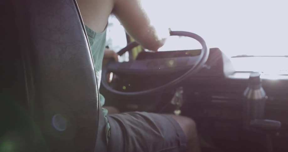Closeup of a man driving a truck