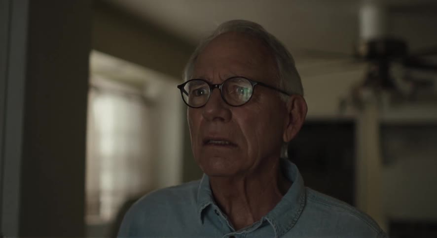 Portrait of an elderly person with a startled facial expression