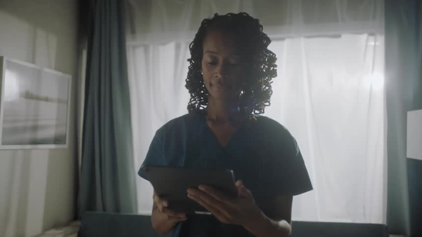 A clip of a nurse operating a device in the room
