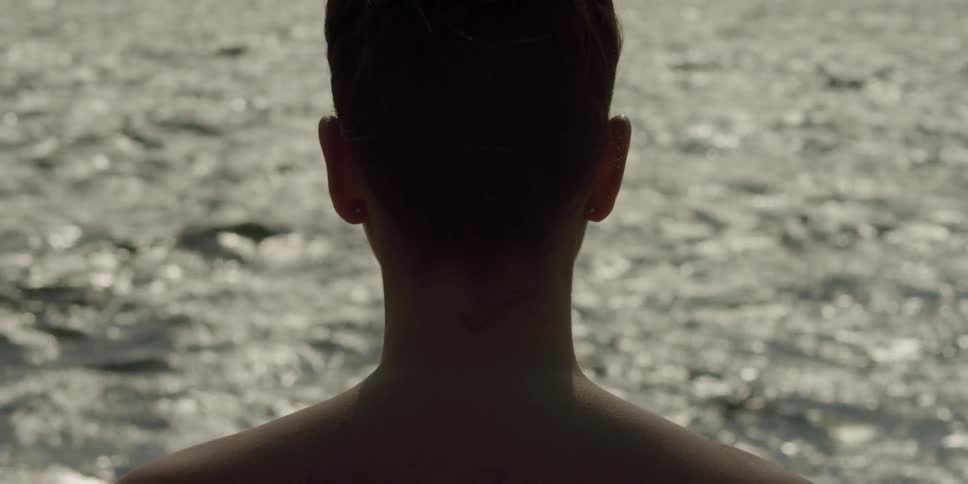 A person is staring at the water