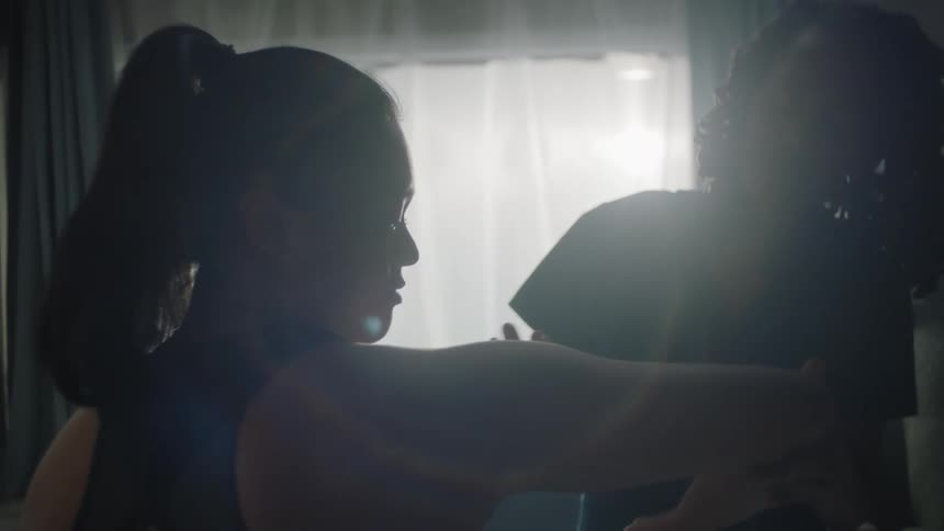 Nurse checking the arm of a patient