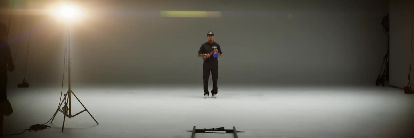 Men are setting up the studio for photography