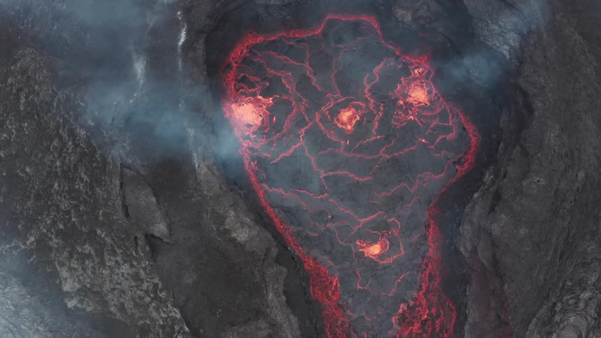 Lava bubbling in an active volcanos crater