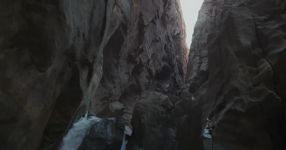 Panorama of a valley with water flowing in a stream