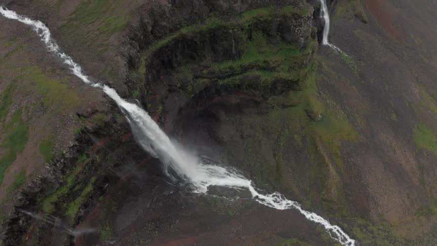 Aerial panorama of a mountain with a waterfall in free fall