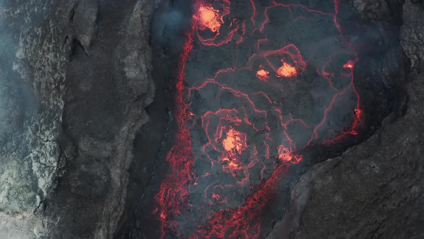 Aerial view of a large erupting volcano