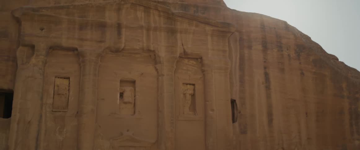 Ancient ruins on a rock in the desert during a hot day