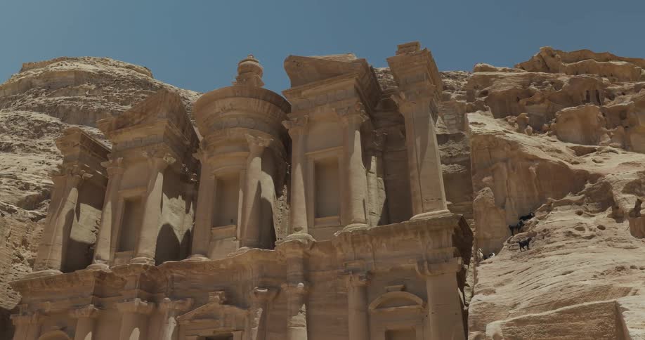 Ruins of a historical monument in the desert between rocky mountains