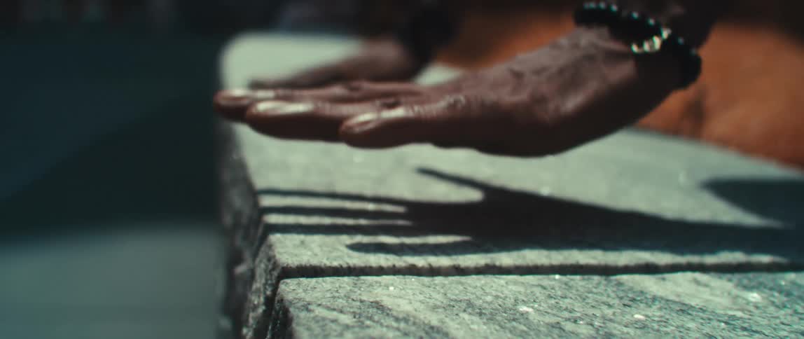 Closeup on a mans hands supporting on concrete in parkout