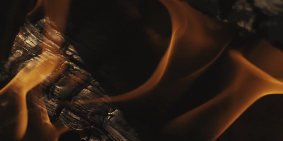 Flames of a bonfire slowly burning